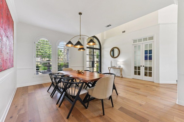 1108 Lakewood Hills Ter, Austin, TX 78732 - dining space with french doors and light wood-type flooring
