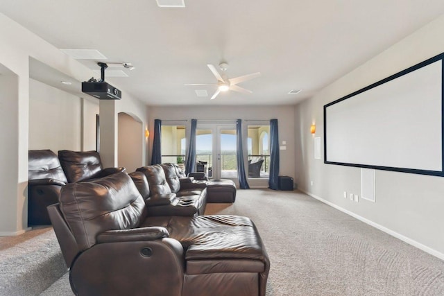 1108 Lakewood Hills Ter, Austin, TX 78732 - carpeted home theater room featuring ceiling fan and arched walkways
