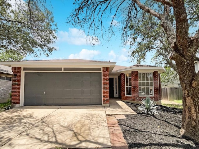 1207 Brashear Ln, Cedar Park, TX 78613 - ranch-style house featuring brick siding, driveway, and a garage