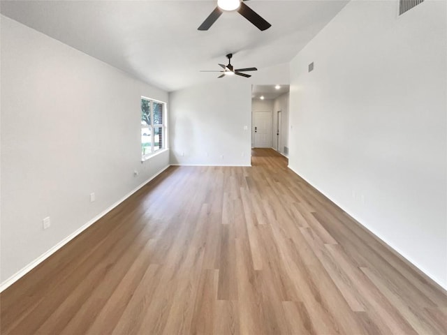 1207 Brashear Ln, Cedar Park, TX 78613 - empty room featuring lofted ceiling, a ceiling fan, and light wood finished floors
