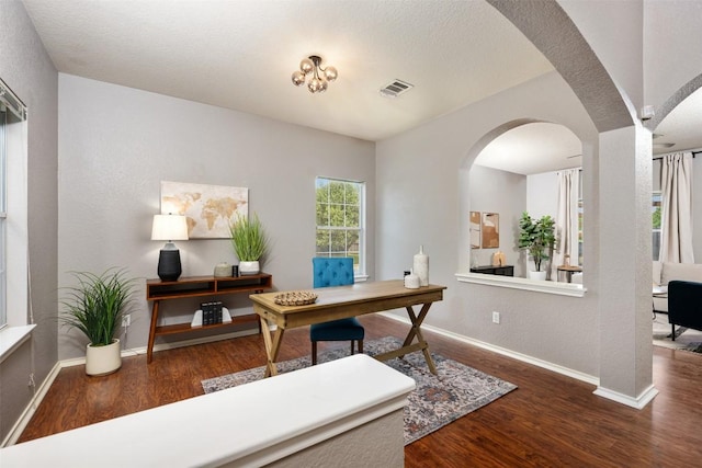 8701 Meridian Oak Ln, Austin, TX 78744 - office space featuring wood finished floors and arched walkways