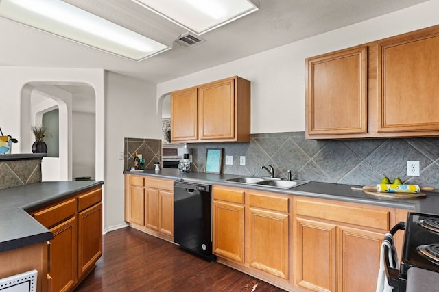 425 Starview St, Temple, TX 76502 - kitchen featuring black appliances, dark wood-style floors, backsplash, and arched walkways