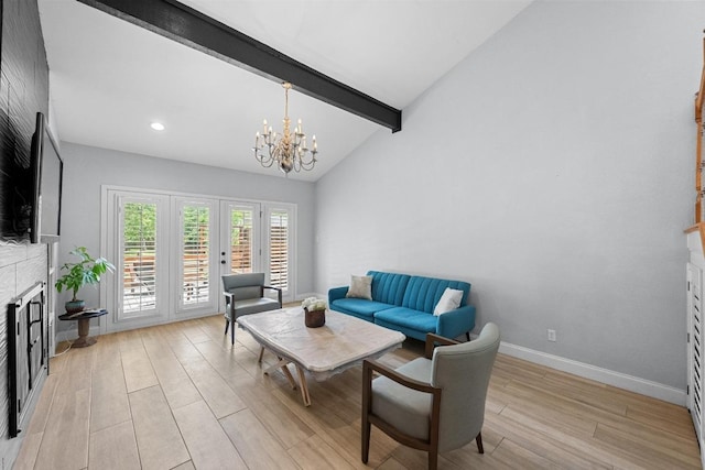 6110 Gardenridge Holw, Austin, TX 78750 - living room featuring french doors, light wood-type flooring, a large fireplace, a chandelier, and recessed lighting