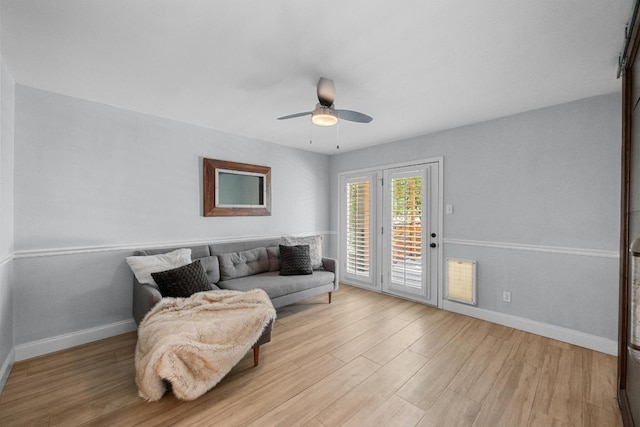 6110 Gardenridge Holw, Austin, TX 78750 - sitting room with wood finished floors and ceiling fan