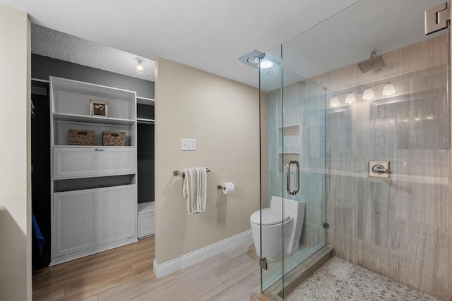 6110 Gardenridge Holw, Austin, TX 78750 - full bathroom featuring a shower stall and wood finished floors