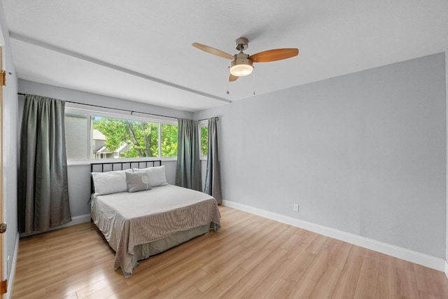6110 Gardenridge Holw, Austin, TX 78750 - bedroom featuring light wood-style flooring and a ceiling fan