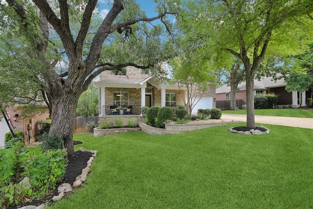 6520 Walebridge Ln, Austin, TX 78739 - view of front of house featuring concrete driveway, a porch, an attached garage, and stone siding