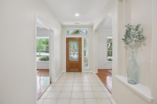 6520 Walebridge Ln, Austin, TX 78739 - entrance foyer featuring arched walkways and light tile patterned flooring