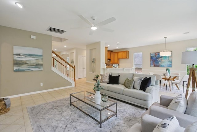 6520 Walebridge Ln, Austin, TX 78739 - living room featuring stairs, light tile patterned floors, healthy amount of natural light, ceiling fan, and recessed lighting