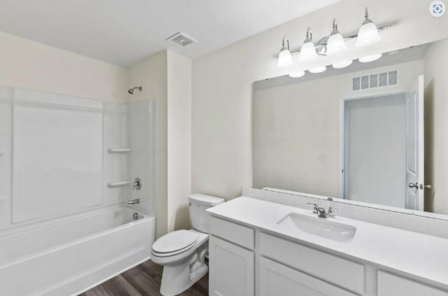 127 Bridgeview Dr, Hutto, TX 78634 - full bath with vanity, wood finished floors, and shower / bath combination