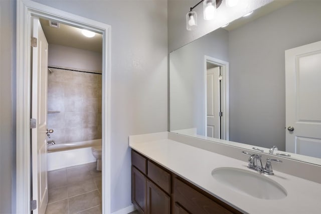 19908 Eire Dr, Pflugerville, TX 78660 - full bathroom featuring vanity, tile patterned floors, and bathtub / shower combination