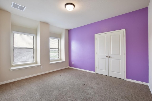 19908 Eire Dr, Pflugerville, TX 78660 - unfurnished bedroom featuring carpet flooring and a closet