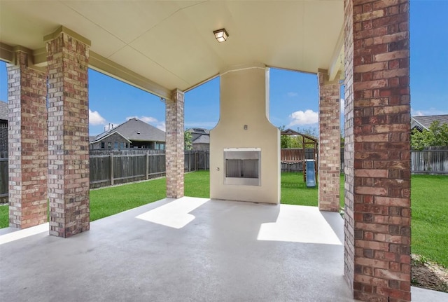19908 Eire Dr, Pflugerville, TX 78660 - fenced backyard with a patio area and a large fireplace