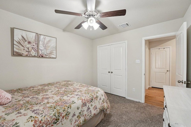 184 Pivot Dr, Taylor, TX 76574 - bedroom with a closet, carpet, and a ceiling fan