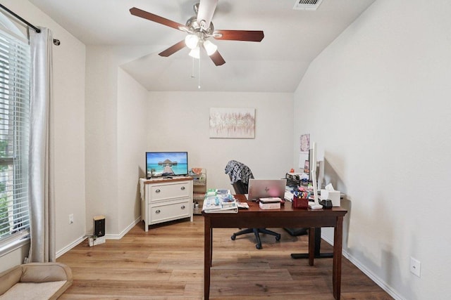 184 Pivot Dr, Taylor, TX 76574 - home office featuring light wood-style floors, a ceiling fan, and lofted ceiling