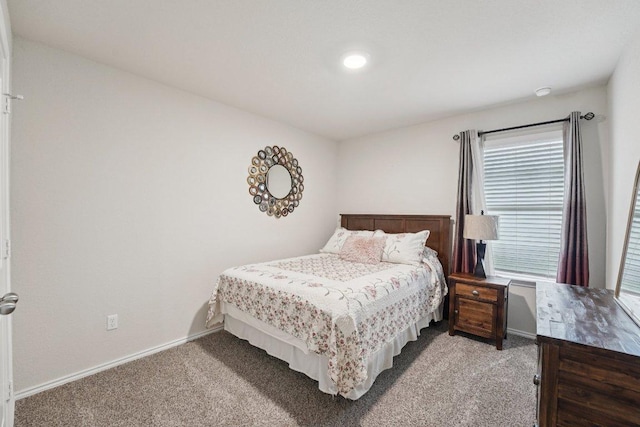 184 Pivot Dr, Taylor, TX 76574 - bedroom featuring carpet flooring and baseboards