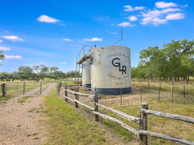 762 Karisch Rd, Giddings, TX 78942 - community sign with a view of countryside and dirt driveway