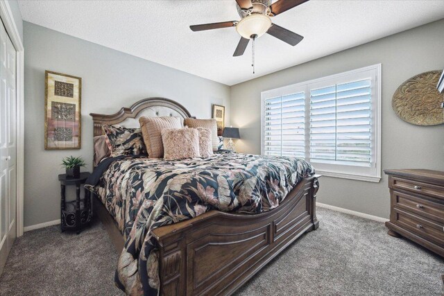 515 Wesley Ridge Dr, Spicewood, TX 78669 - carpeted bedroom featuring baseboards and a ceiling fan