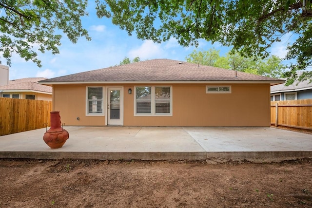 14608 Menifee St, Austin, TX 78725 - back of house with a patio area