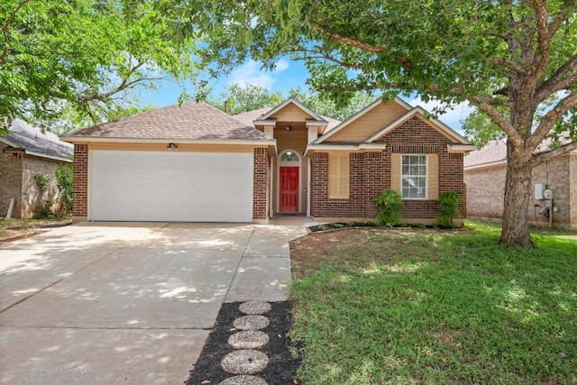 14608 Menifee St, Austin, TX 78725 - view of front of property featuring an attached garage, driveway, brick siding, a front yard, and roof with shingles