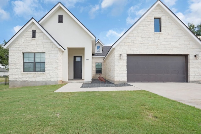 809 John Price, Blanco, TX 78606 - view of front of house featuring stone siding, a front lawn, driveway, and a shingled roof