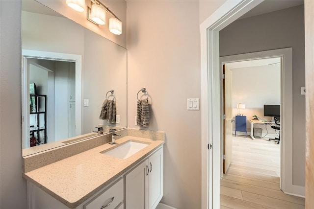 14708 Longbranch Dr, Austin, TX 78734 - bathroom with wood finished floors and vanity