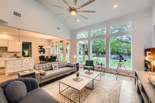 14708 Longbranch Dr, Austin, TX 78734 - living area with high vaulted ceiling, ceiling fan, a chandelier, and recessed lighting