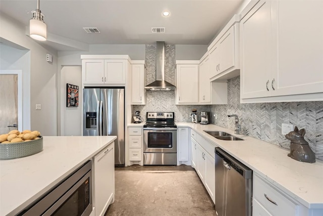 14708 Longbranch Dr, Austin, TX 78734 - kitchen with stainless steel appliances, wall chimney exhaust hood, concrete floors, white cabinets, and decorative backsplash