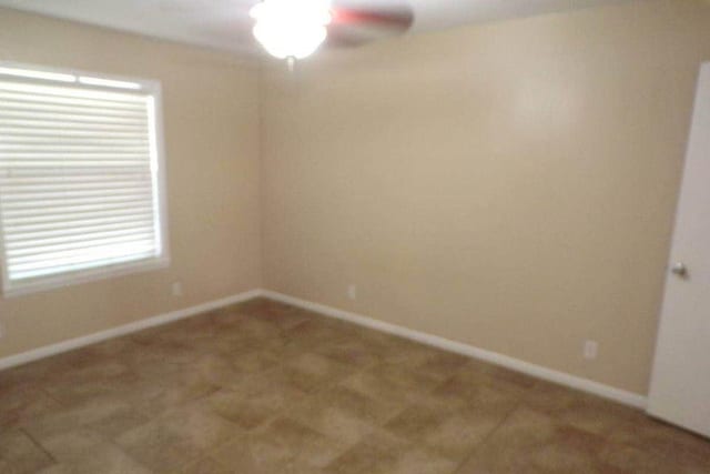 729 Yegua Dr, Lexington, TX 78947 - carpeted empty room featuring baseboards