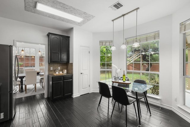 8405 Ganttcrest Dr, Austin, TX 78749 - dining space with dark wood-style flooring and baseboards
