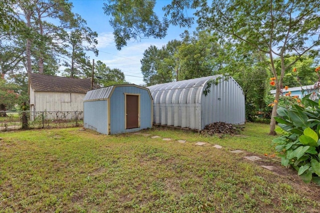 710 Gresham St, Smithville, TX 78957 - view of yard featuring a storage unit