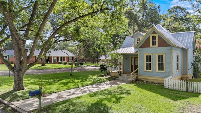 710 Gresham St, Smithville, TX 78957 - view of front facade featuring a metal roof