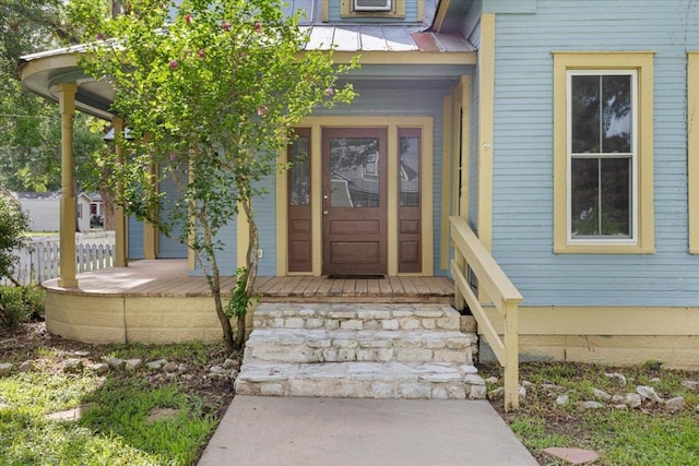 710 Gresham St, Smithville, TX 78957 - property entrance featuring a metal roof and a standing seam roof