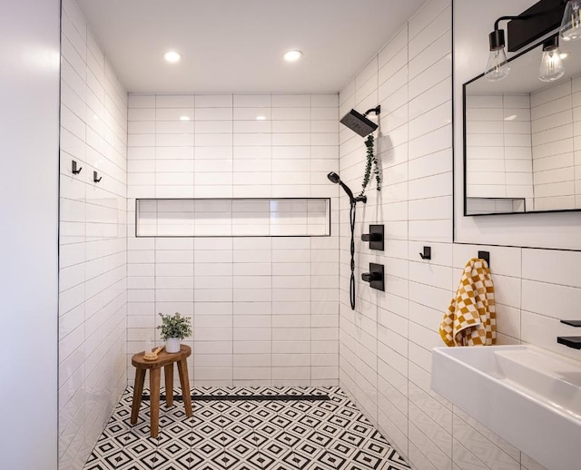 2306 Monarch Dr, Austin, TX 78748 - full bathroom with tile walls, tiled shower, and recessed lighting