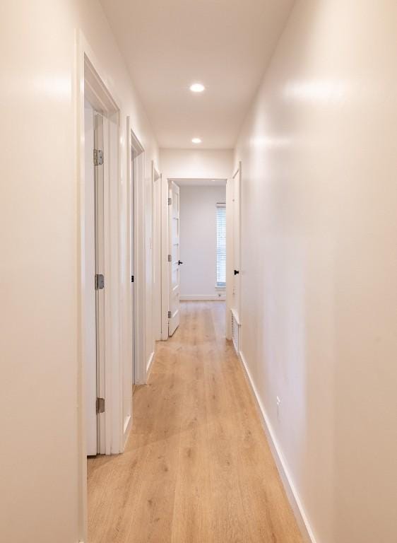 2306 Monarch Dr, Austin, TX 78748 - corridor featuring light wood finished floors and recessed lighting