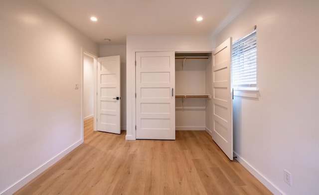 2306 Monarch Dr, Austin, TX 78748 - unfurnished bedroom with light wood-type flooring, a closet, and recessed lighting