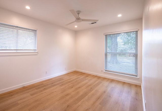 2306 Monarch Dr, Austin, TX 78748 - empty room featuring healthy amount of natural light, light wood-type flooring, a ceiling fan, and recessed lighting