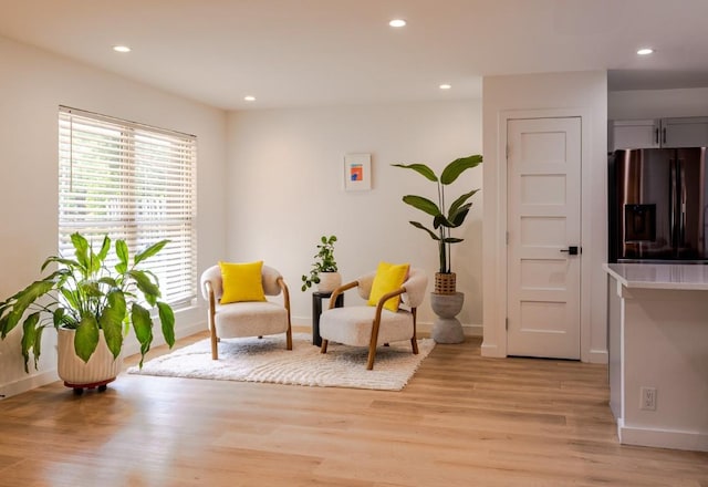 2306 Monarch Dr, Austin, TX 78748 - sitting room with light wood finished floors and recessed lighting