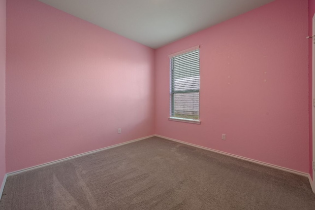 241 Pivot Dr, Taylor, TX 76574 - carpeted empty room featuring baseboards