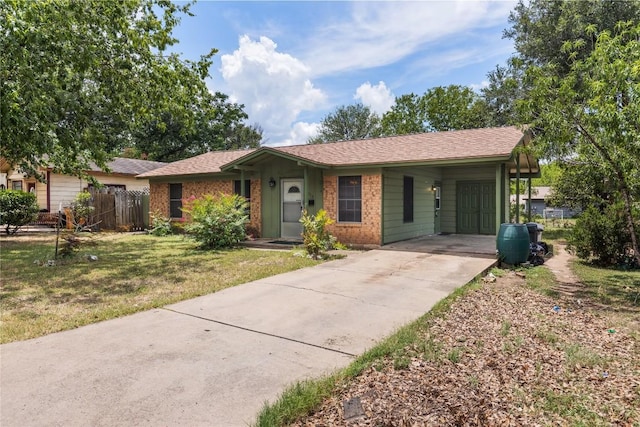 5708 Garden Oaks Dr, Austin, TX 78745 - single story home with driveway, a carport, and brick siding