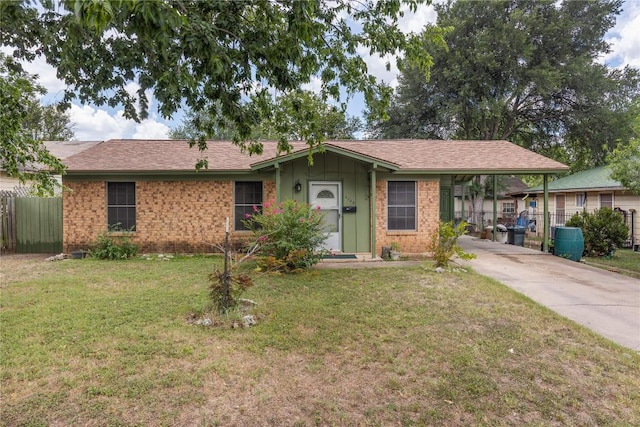 5708 Garden Oaks Dr, Austin, TX 78745 - ranch-style house featuring concrete driveway, brick siding, an attached carport, and board and batten siding
