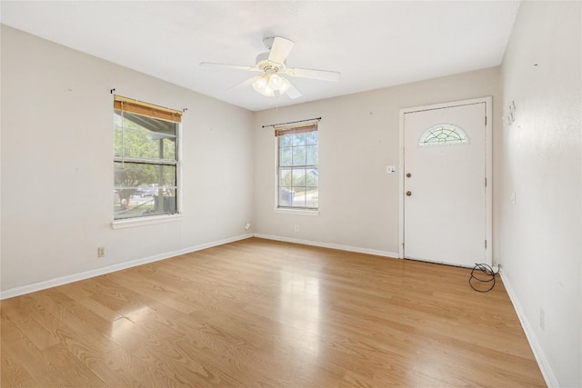 5708 Garden Oaks Dr, Austin, TX 78745 - entrance foyer with light wood-style floors and a ceiling fan