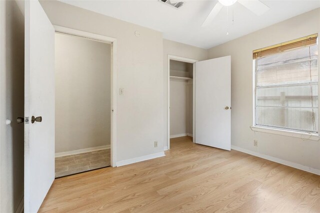 5708 Garden Oaks Dr, Austin, TX 78745 - unfurnished bedroom with light wood-style flooring, a closet, and ceiling fan