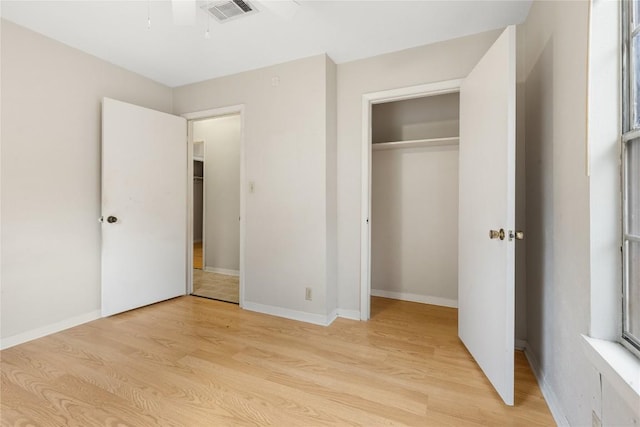 5708 Garden Oaks Dr, Austin, TX 78745 - unfurnished bedroom featuring light wood finished floors and a closet