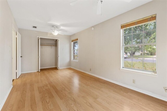 5708 Garden Oaks Dr, Austin, TX 78745 - unfurnished bedroom featuring light wood finished floors, a closet, and ceiling fan