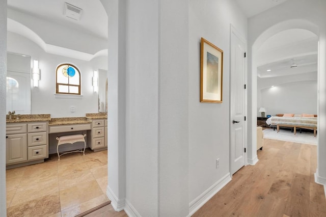 1006 Foothills Dr, Dripping Springs, TX 78620 - hall featuring a desk and light wood finished floors