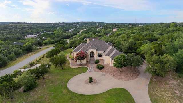1006 Foothills Dr, Dripping Springs, TX 78620 - view of subject property with a forest