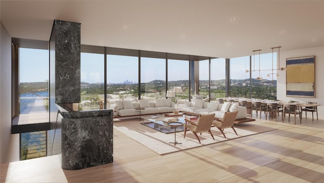 6507 Bridge Point Pkwy Lot 4, Austin, TX 78730 - living room with floor to ceiling windows, wood finished floors, and a mountain view