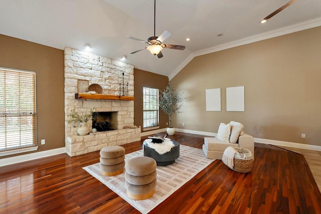 1806 Carey Ave, Taylor, TX 76574 - living area with ceiling fan, vaulted ceiling, wood finished floors, ornamental molding, and a fireplace