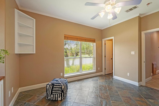 1806 Carey Ave, Taylor, TX 76574 - unfurnished room featuring stone tile floors, ceiling fan, and ornamental molding